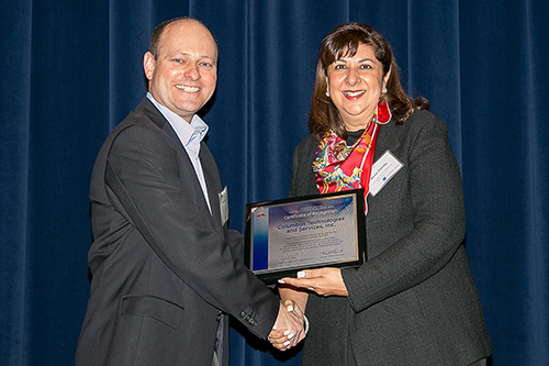 Columbus President, Reva Handa accepting the 2017 JPL Subcontractor of the Year Award presented by NASA JPL Deputy Director for Engineering and Science, Jordan Evans Columbus President, Reva Handa accepting the 2017 JPL Subcontractor of the Year Award presented by NASA JPL Deputy Director for Engineering and Science, Jordan Evans