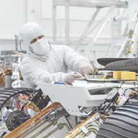 Technician working on JPL NASA Mars Rover in cleanroom NASA/JPL-Caltech