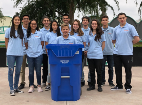 Granada Hills Charter School Students standing behind recycle bin